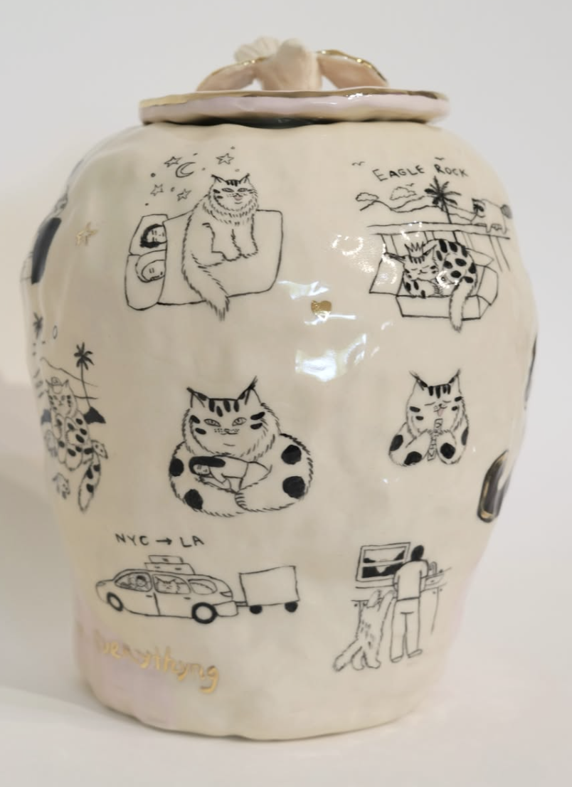 Ceramic vessel painted with small cats and scenes