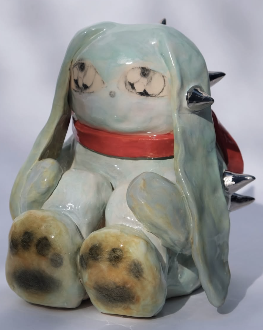 Blue ceramic bunny figure with spiked details