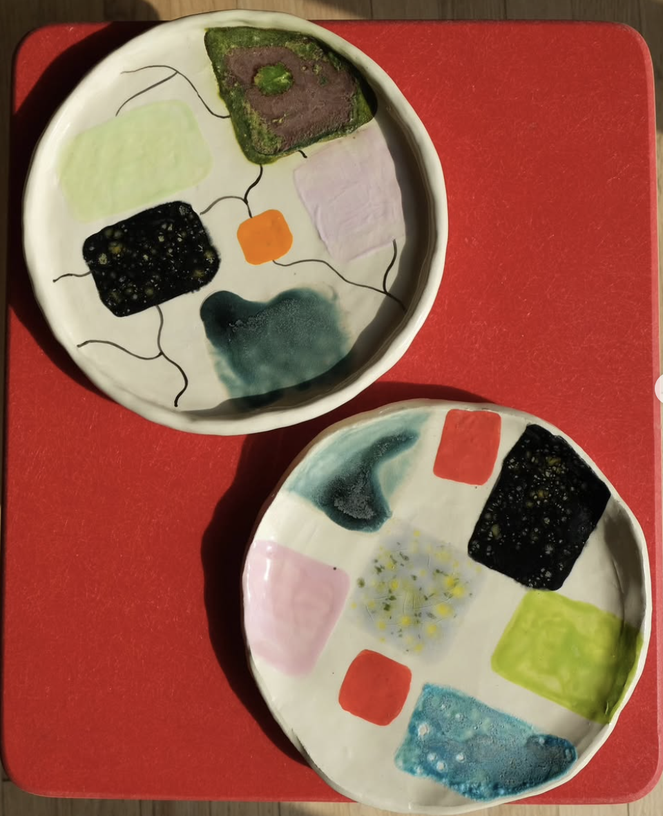 Two ceramic bowls with colorful abstract squares