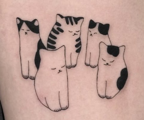 Fine-line tattoo of five small cats