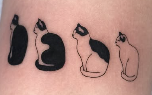 Linework tattoo of four sitting cats in a row
