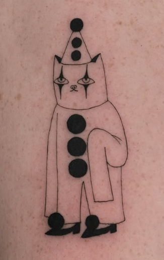 Linework tattoo of a clown cat in a pointed hat