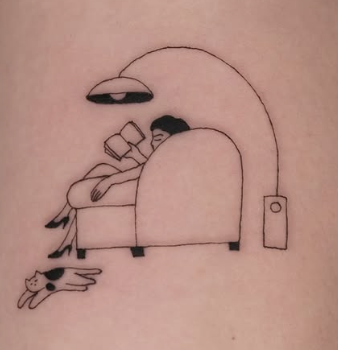 Linework tattoo of a person reading in an armchair under a lamp