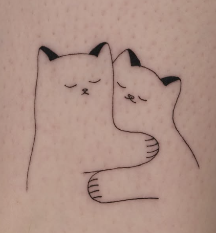 Linework tattoo of two cats hugging