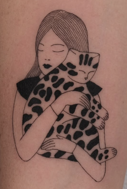 Linework tattoo of a woman holding a spotted cat