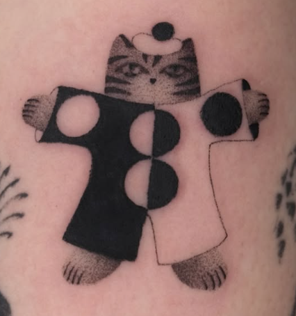 Shaded tattoo of a striped clown cat with big buttons
