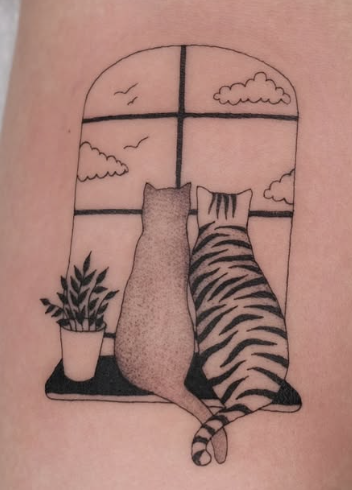 Shaded tattoo of two cats looking out a window
