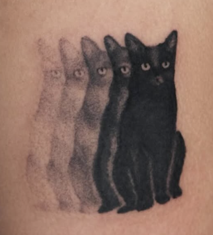 Shaded tattoo of a row of fading black cats